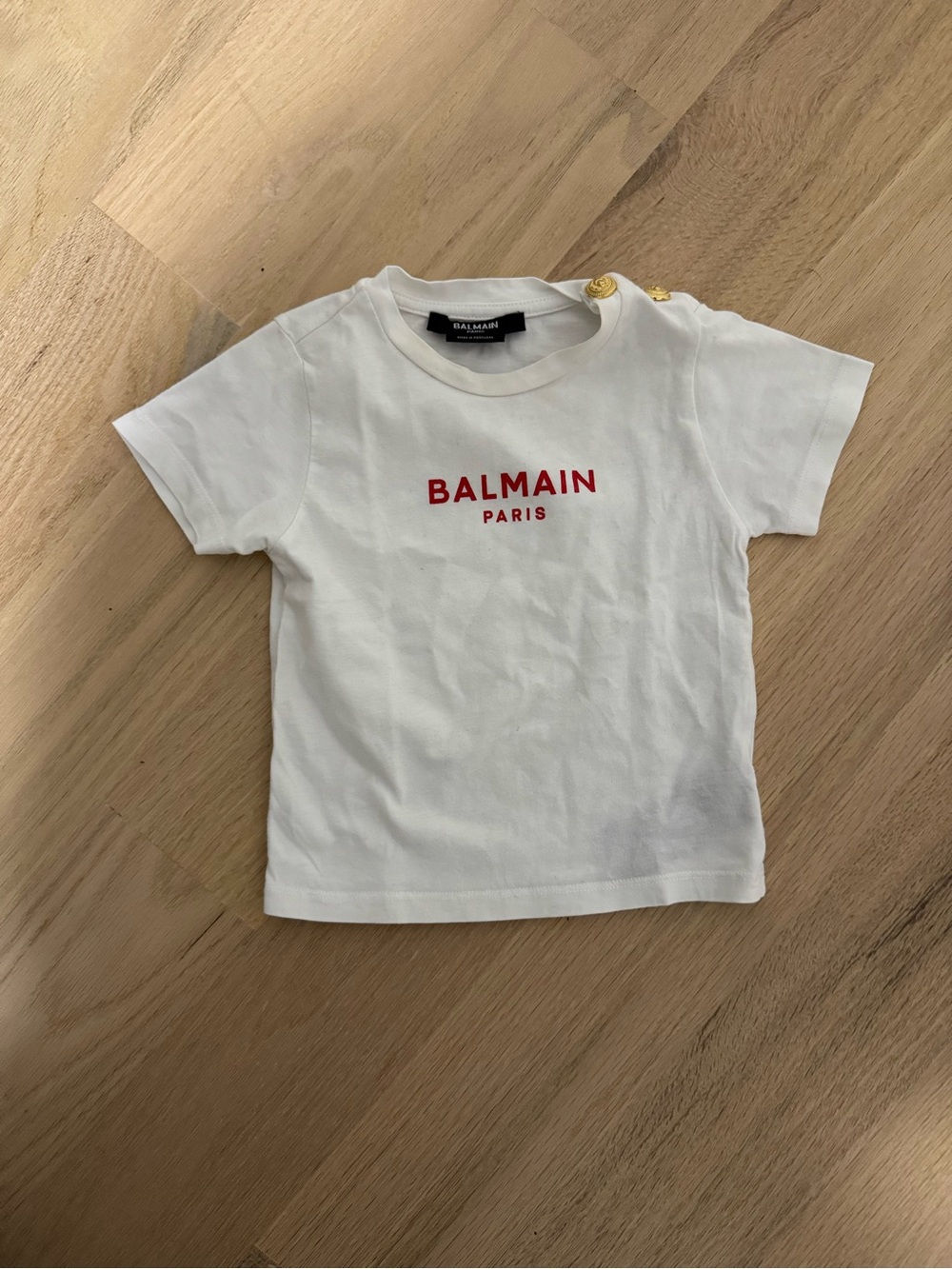 Balmain Baby White Tee with Red Logo and Gold Buttons Size 12M